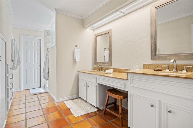 107 Angelfish, Aransas Pass, TX 78336 - full bathroom featuring double vanity, crown molding, and tile patterned floors