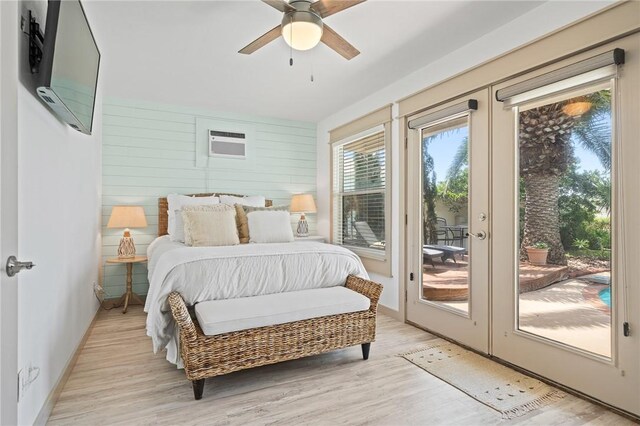 107 Angelfish, Aransas Pass, TX 78336 - bedroom with access to exterior, light wood-style floors, french doors, and a ceiling fan