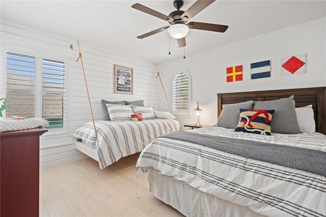 107 Angelfish, Aransas Pass, TX 78336 - bedroom featuring light wood finished floors and a ceiling fan