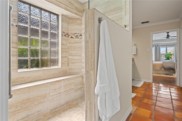 107 Angelfish, Aransas Pass, TX 78336 - ensuite bathroom featuring crown molding, a walk in shower, tile patterned flooring, and ceiling fan