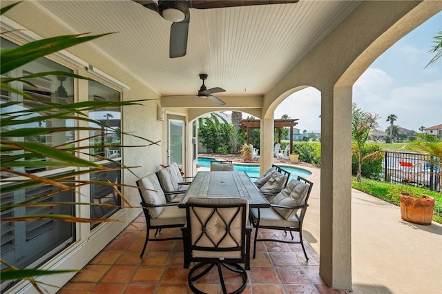 107 Angelfish, Aransas Pass, TX 78336 - view of patio with a ceiling fan and outdoor dining space