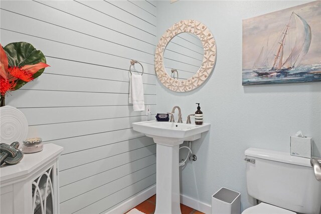 107 Angelfish, Aransas Pass, TX 78336 - bathroom featuring toilet and baseboards