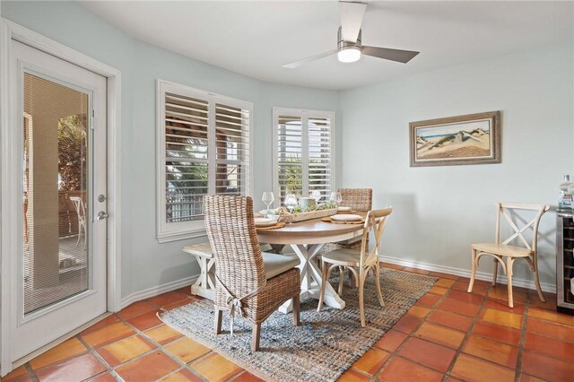 107 Angelfish, Aransas Pass, TX 78336 - dining area with light tile patterned floors and ceiling fan
