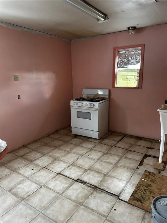 2201 Comanche St, Corpus Christi, TX 78408 - kitchen with white gas range oven