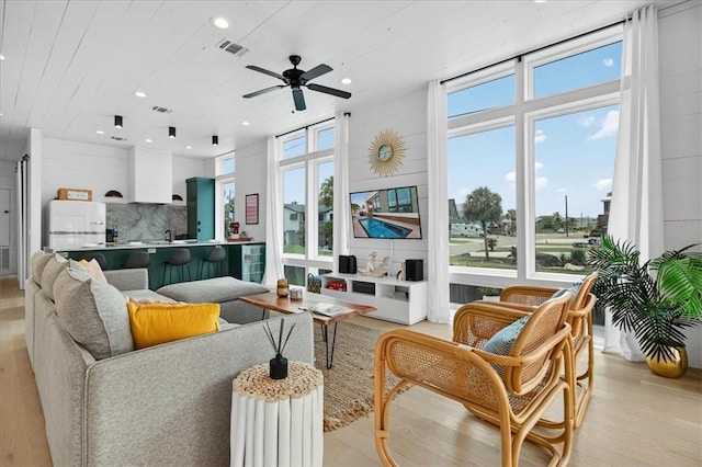 602 Island Retreat Ct, Port Aransas, TX 78373 - living area with light wood-style flooring, recessed lighting, and ceiling fan