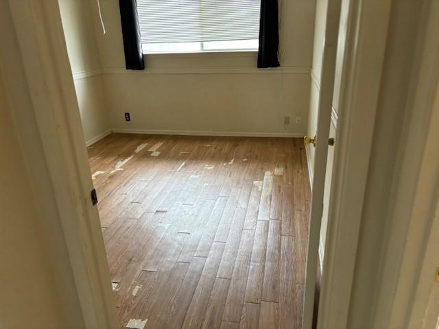 empty room featuring light wood-type flooring