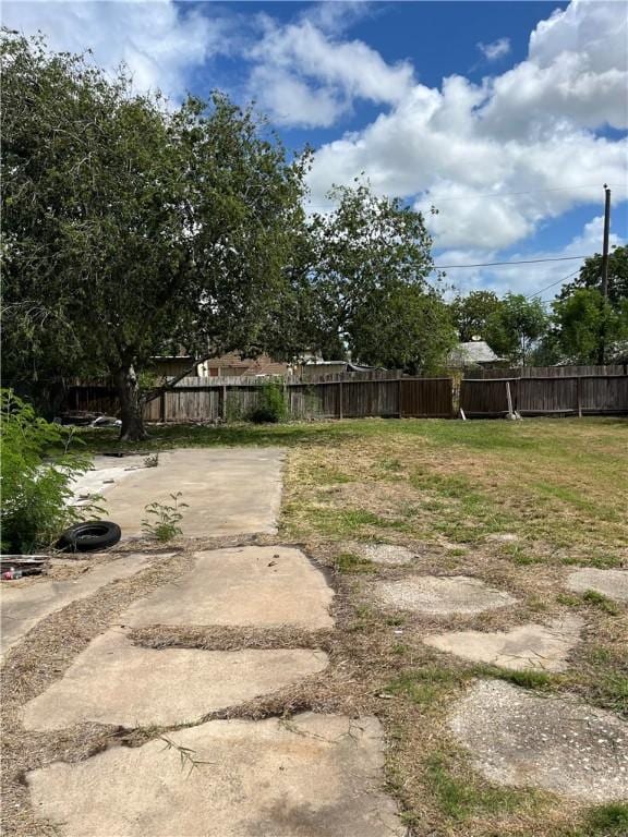 5122 Thomas Dr, Corpus Christi, TX 78407 - view of yard featuring a patio area