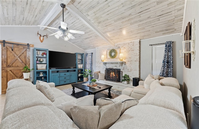 living room featuring a fireplace, lofted ceiling with beams, a barn door, wood ceiling, and tile patterned flooring