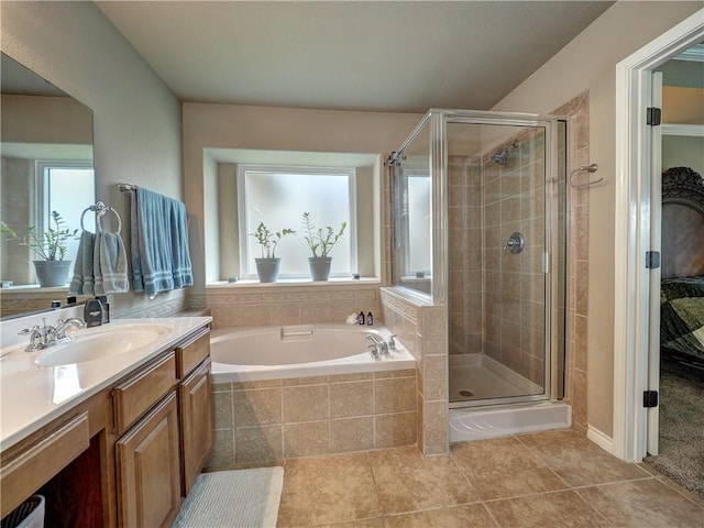 7509 Rancho Vis, Corpus Christi, TX 78414 - full bath with tile patterned flooring, a shower stall, a bath, and vanity