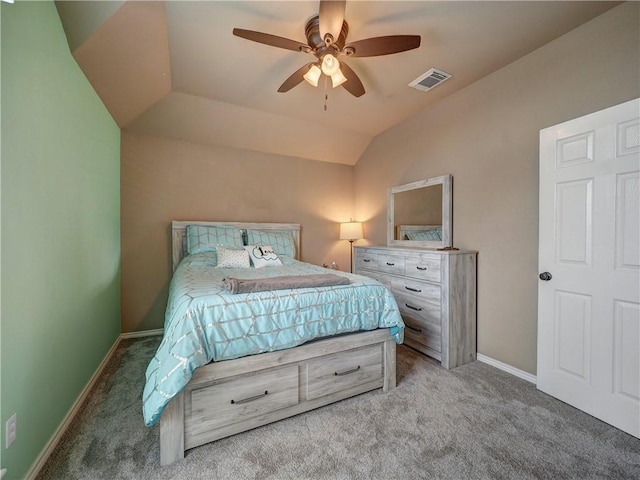 bedroom featuring visible vents, lofted ceiling, baseboards, ceiling fan, and carpet