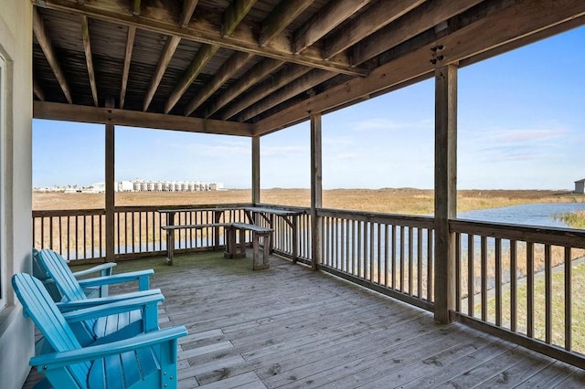 deck featuring a water view