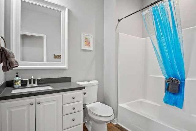 full bath featuring toilet, shower / bath combination with curtain, and vanity