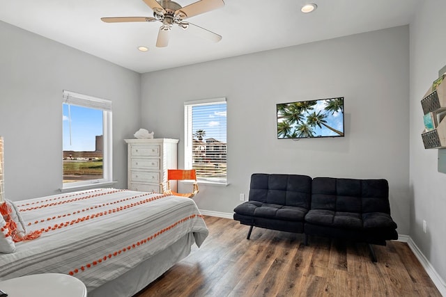 bedroom featuring ceiling fan, baseboards, wood finished floors, and recessed lighting