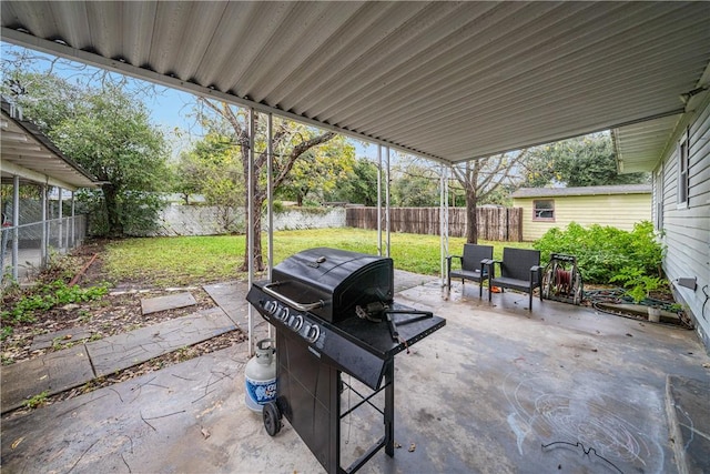 view of patio with a grill