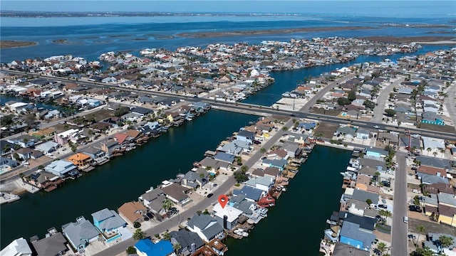 15354 Caravel Dr, Corpus Christi, TX 78418 - aerial view of property's location with a nearby body of water and nearby suburban area
