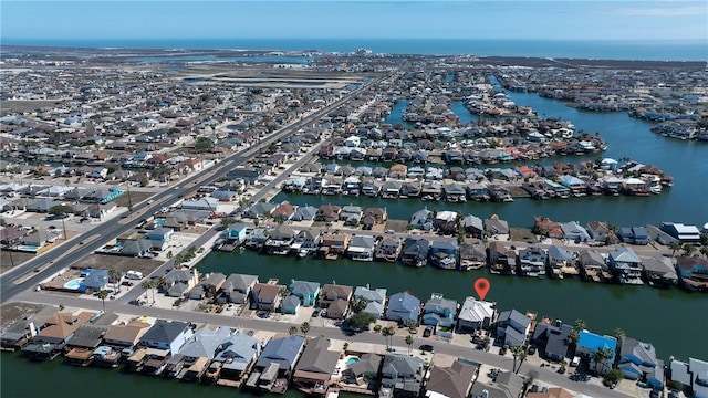 15354 Caravel Dr, Corpus Christi, TX 78418 - aerial overview of property's location featuring nearby suburban area and a large body of water