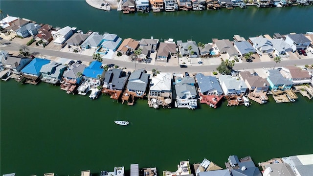 15354 Caravel Dr, Corpus Christi, TX 78418 - aerial view of property's location featuring nearby suburban area and a large body of water