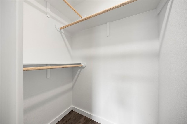936 S 10th St, Aransas Pass, TX 78336 - spacious closet featuring dark wood-style flooring
