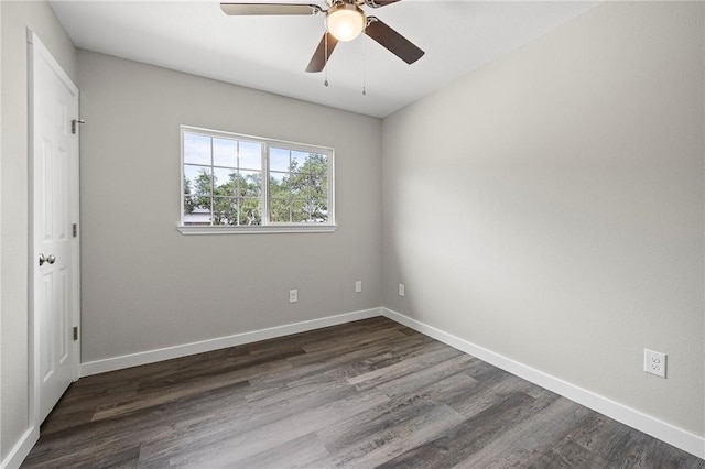 936 S 10th St, Aransas Pass, TX 78336 - empty room with dark wood finished floors, baseboards, and a ceiling fan