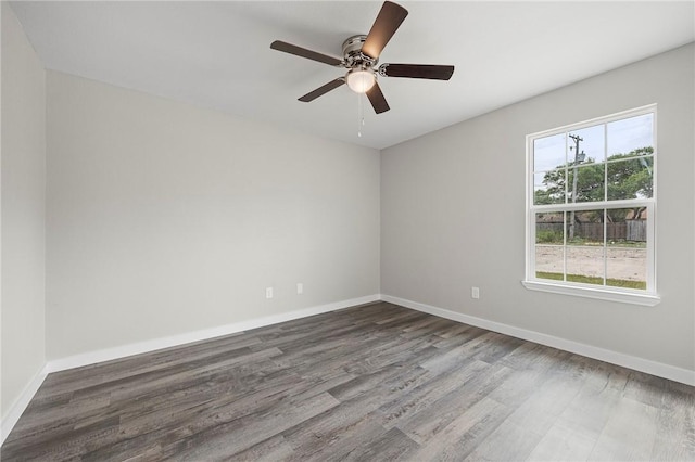 936 S 10th St, Aransas Pass, TX 78336 - spare room featuring baseboards, a ceiling fan, and wood finished floors