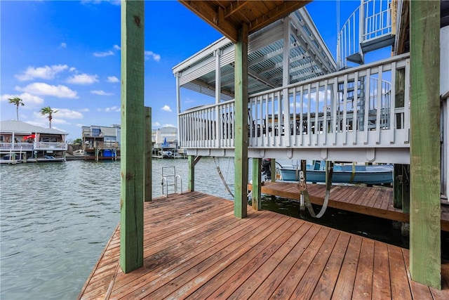 view of dock with a water view and boat lift