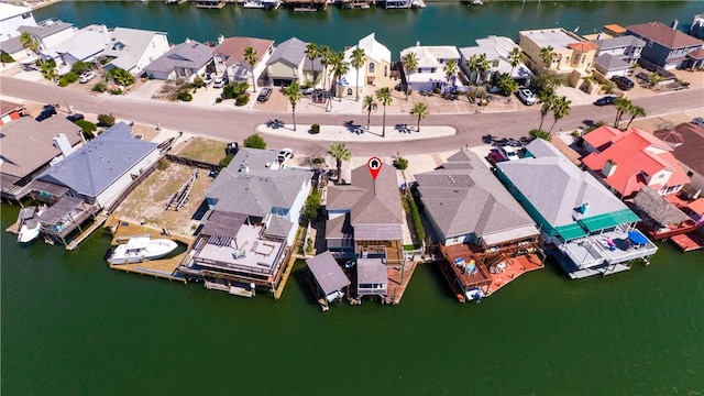 aerial view with a water view and a residential view