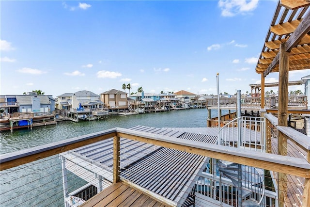 dock area with a water view