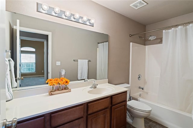 full bathroom with toilet, tile patterned floors, shower / bath combo, and vanity