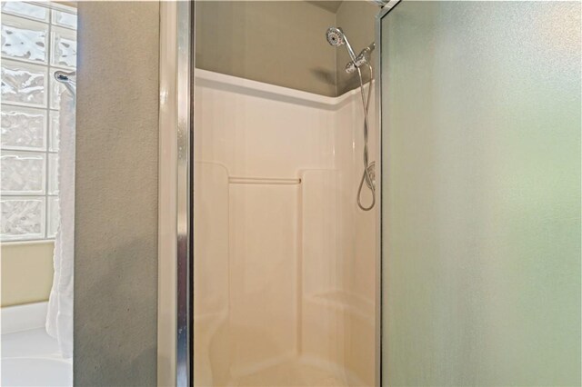 bathroom with walk in shower