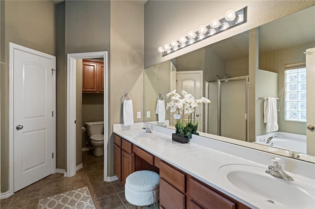 full bathroom with toilet, plus walk in shower, tile patterned floors, and vanity