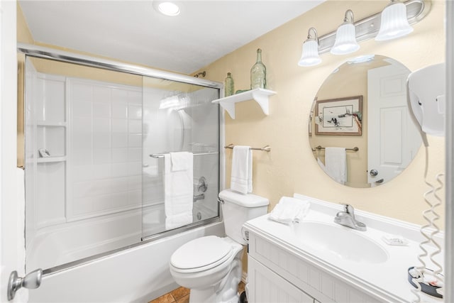 full bathroom with toilet, vanity, and enclosed tub / shower combo