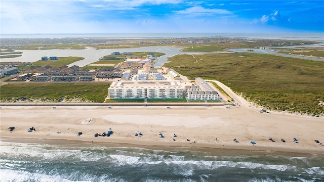 aerial view featuring a water view and a view of the beach