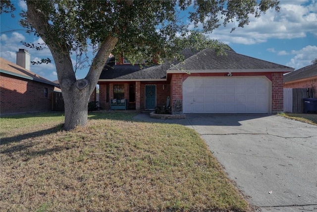 ranch-style home featuring a garage and a front lawn