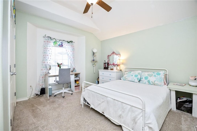 bedroom featuring lofted ceiling, light colored carpet, ceiling fan, and baseboards