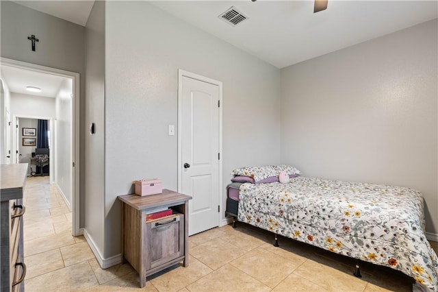 3902 Elvis Dr, Corpus Christi, TX 78414 - bedroom with light tile patterned flooring, baseboards, and ceiling fan