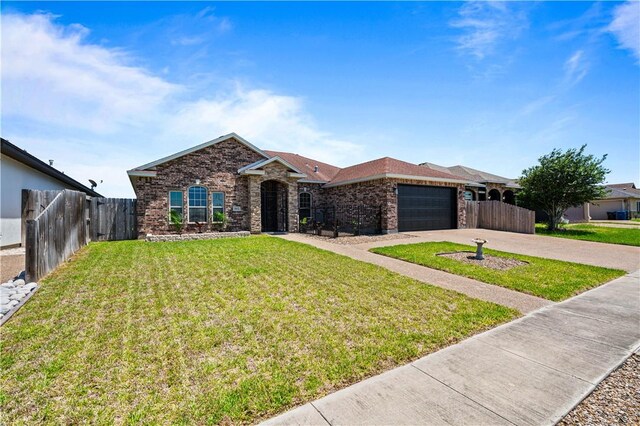 3902 Elvis Dr, Corpus Christi, TX 78414 - ranch-style home featuring brick siding, an attached garage, and concrete driveway
