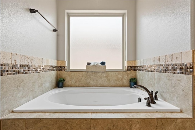 3902 Elvis Dr, Corpus Christi, TX 78414 - full bath with a garden tub and a textured wall