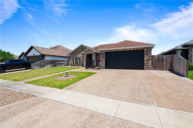 3902 Elvis Dr, Corpus Christi, TX 78414 - view of front facade with an attached garage and driveway
