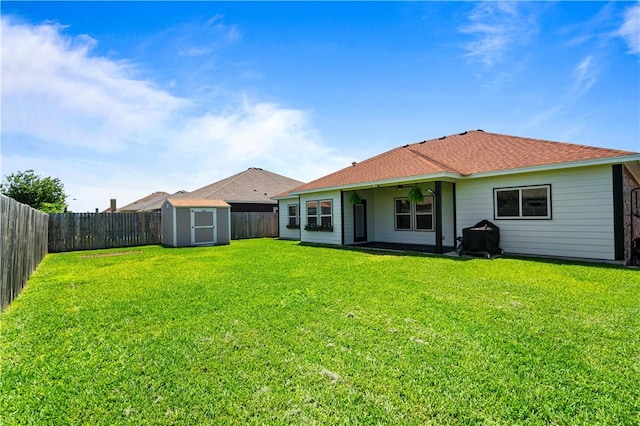 3902 Elvis Dr, Corpus Christi, TX 78414 - back of house with a storage unit, a ceiling fan, and an outdoor structure
