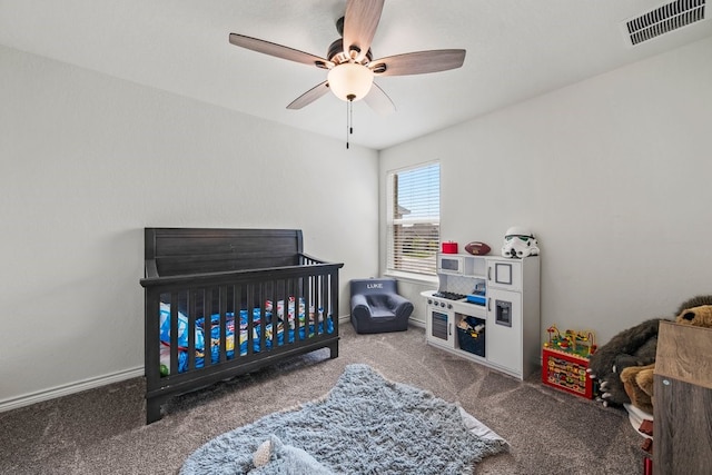 1947 Brandywine Dr, New Braunfels, TX 78132 - bedroom with carpet, ceiling fan, a crib, and baseboards