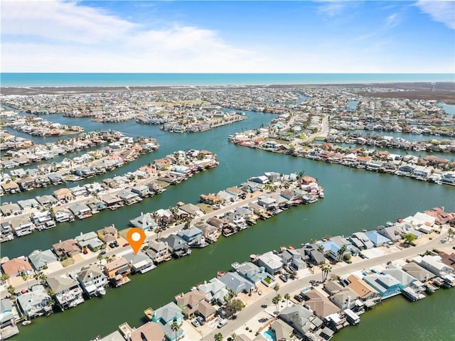 15321 Beaufort Ct, Corpus Christi, TX 78418 - aerial view of property and surrounding area featuring a large body of water and nearby suburban area