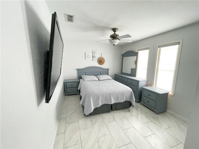 15321 Beaufort Ct, Corpus Christi, TX 78418 - bedroom featuring light marble finish floors and ceiling fan