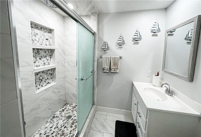 15321 Beaufort Ct, Corpus Christi, TX 78418 - bathroom with marble finish floors, vanity, and a shower stall