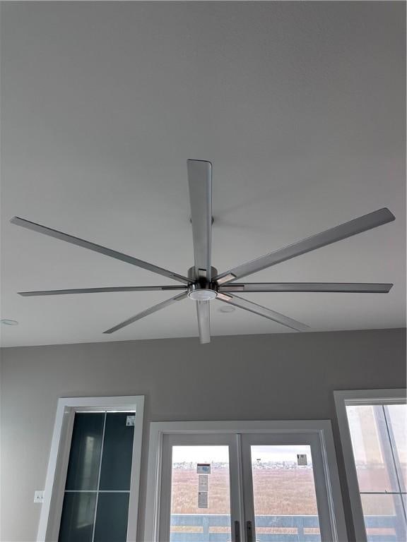 room details with ceiling fan and french doors