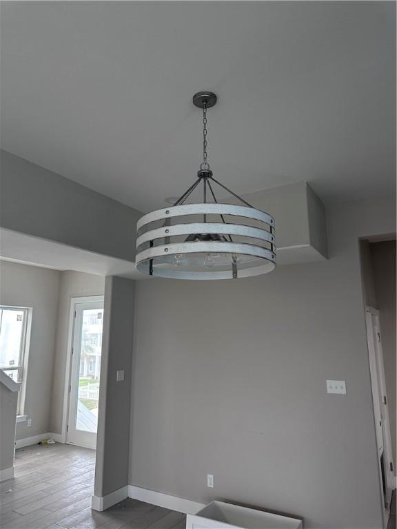 unfurnished dining area featuring light hardwood / wood-style flooring