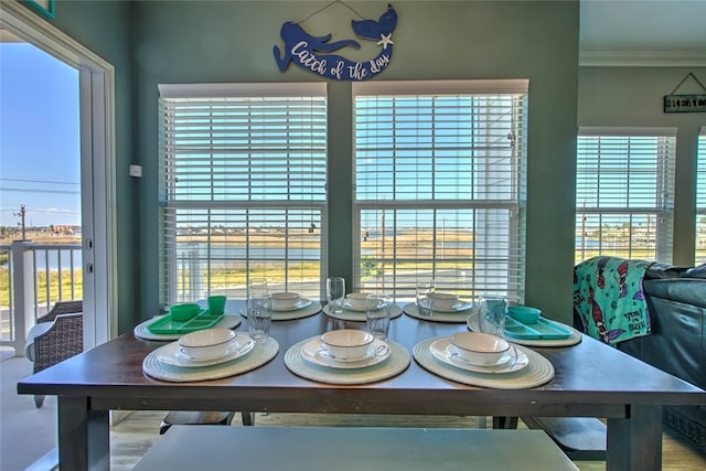 dining room featuring ornamental molding