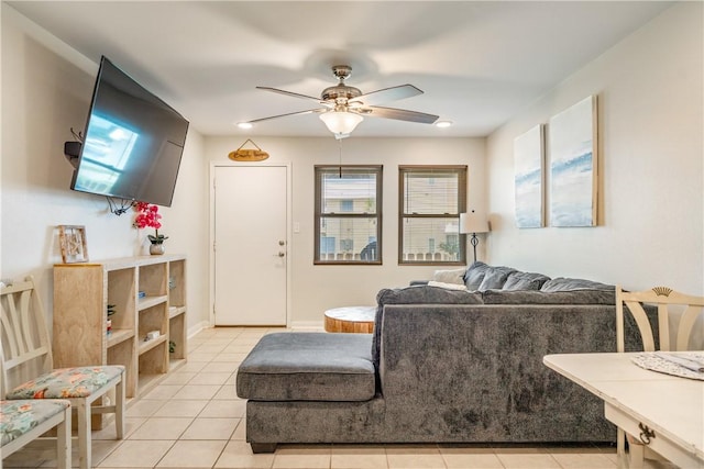 living room with light tile patterned floors and ceiling fan
