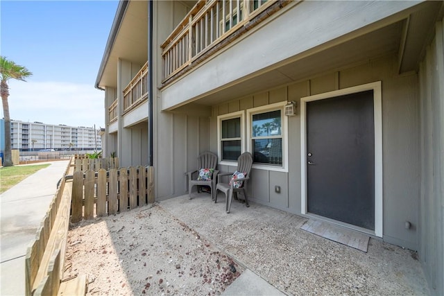 view of patio featuring fence