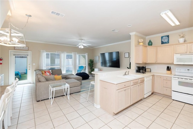15102 Leeward Dr Unit 702, Corpus Christi, TX 78418 - kitchen featuring white appliances, open floor plan, light tile patterned floors, crown molding, and a peninsula