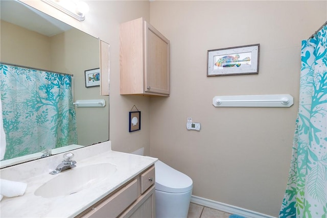 15102 Leeward Dr Unit 702, Corpus Christi, TX 78418 - bathroom featuring tile patterned flooring, vanity, and toilet